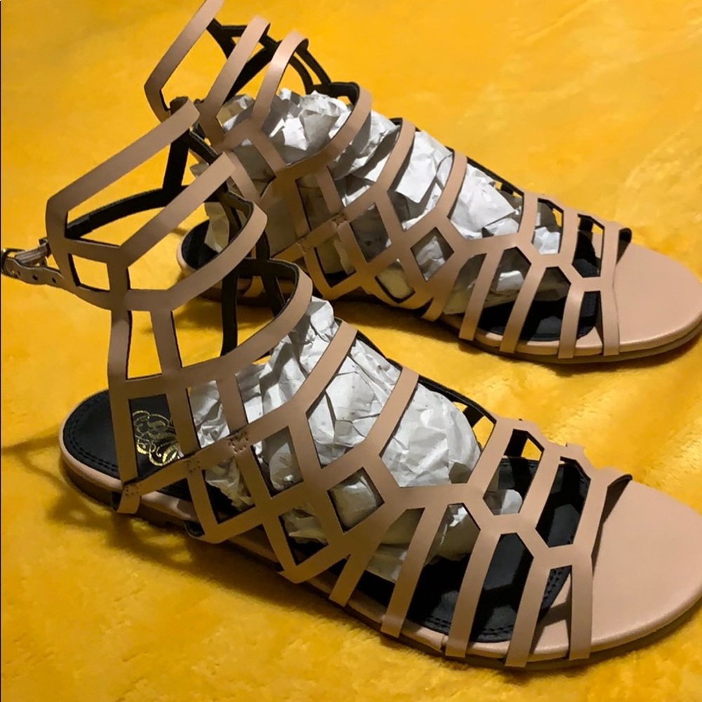 Tan, peachy color gladiator sandals.